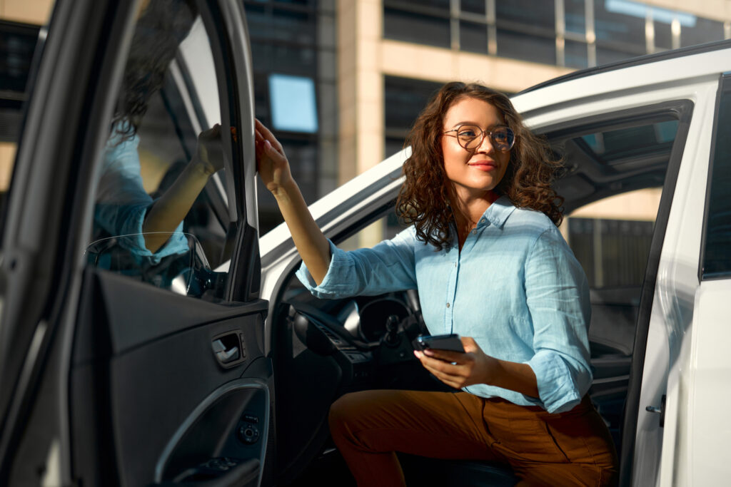 woman near car on the street